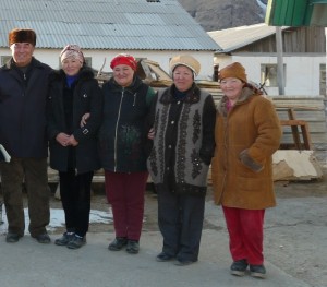 Raiysa Enilchek cropped Raiysa and member of her community