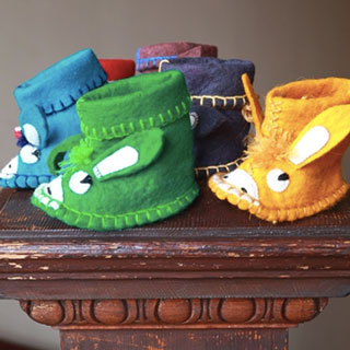 Colorful baby booties are among our best-selling SLE products